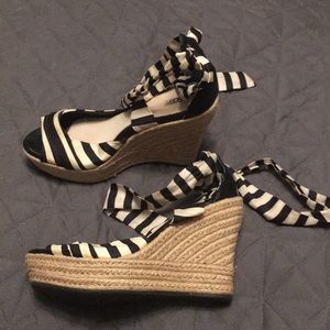 Black and white stripe espadrilles.